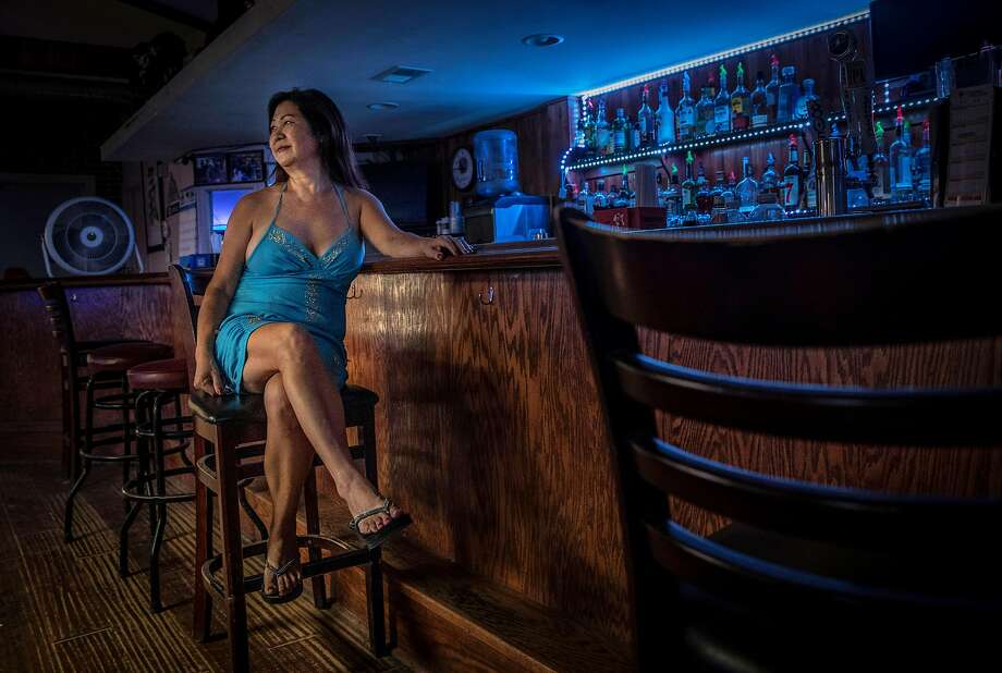 Yong Simas owns Yong’s Bar &amp; Grill in Holt. She’s lived in the delta region for decades and lives in a mobile home behind her business. Photo: Carlos Avila Gonzalez / The Chronicle
