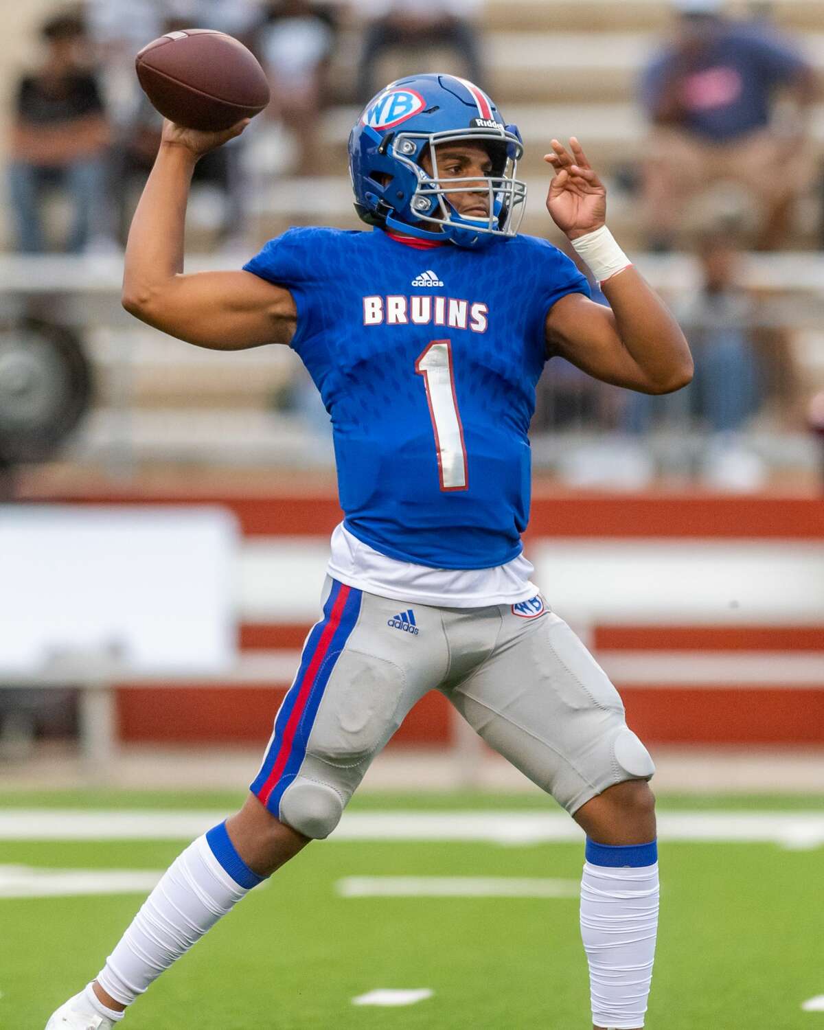 Bruins quarterback Bryce Anderson (1) launches a pass in the first half as the Beaumont United Timberwolves and the West Brook Bruins squared off in the Alumni Bowl Scrimmage at BISD Memorial Stadium on Thursday night. Photo made on September 24, 2020. Fran Ruchalski/The Enterprise