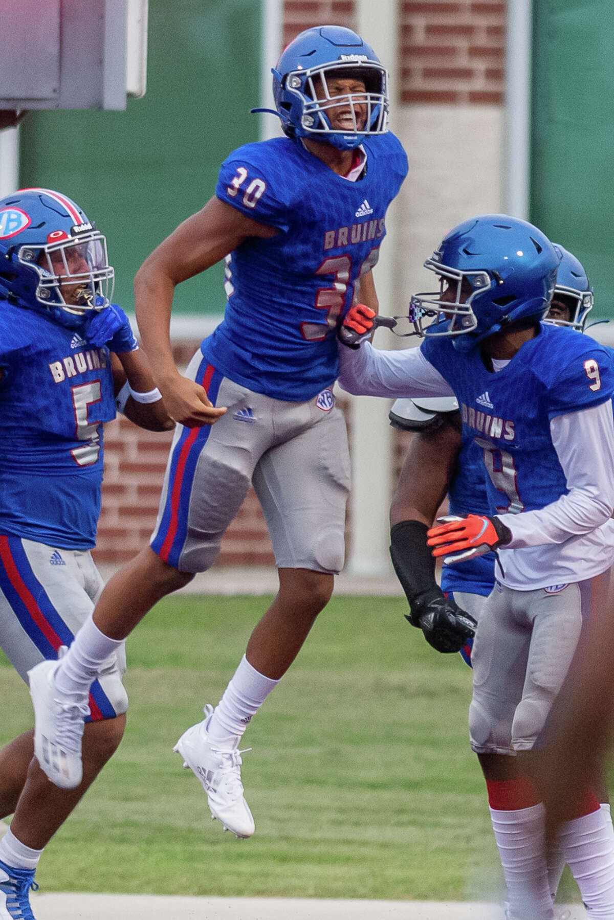 The Beaumont United Timberwolves and the West Brook Bruins squared off in the Alumni Bowl Scrimmage at BISD Memorial Stadium on Thursday night. Photo made on September 24, 2020. Fran Ruchalski/The Enterprise