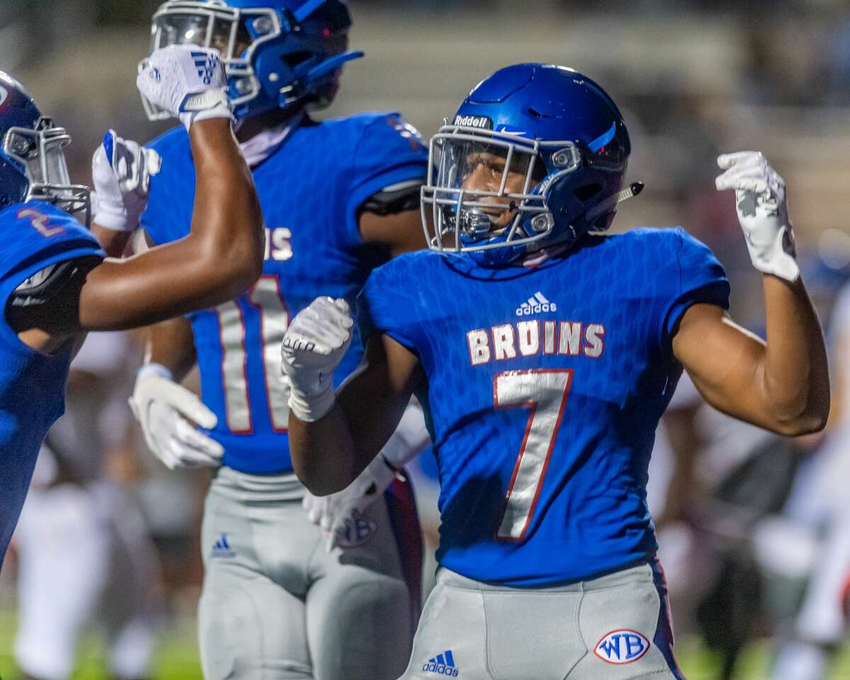Bruins Jordan Guidry (7) carries the ball in the first half as the Beaumont United Timberwolves and the West Brook Bruins squared off in the Alumni Bowl Scrimmage at BISD Memorial Stadium on Thursday night. Photo made on September 24, 2020. Fran Ruchalski/The Enterprise
