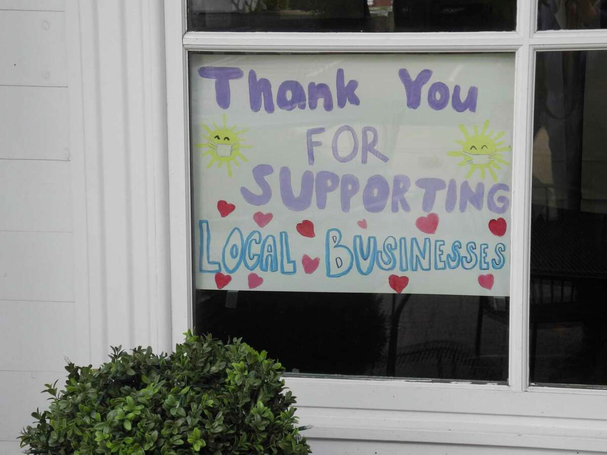 A sign in the window of Marly's Bar & Bistro in Wilton Center, from May 2020, expresses the sentiments of many businesses in town. Under Phase 3, restaurants will now be allowed greater capacity.