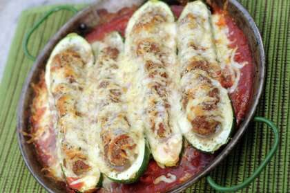 A paella pan is the perfect baking dish for recipes such as Beef-stuffed Zucchini in Herbed Tomato Sauce .