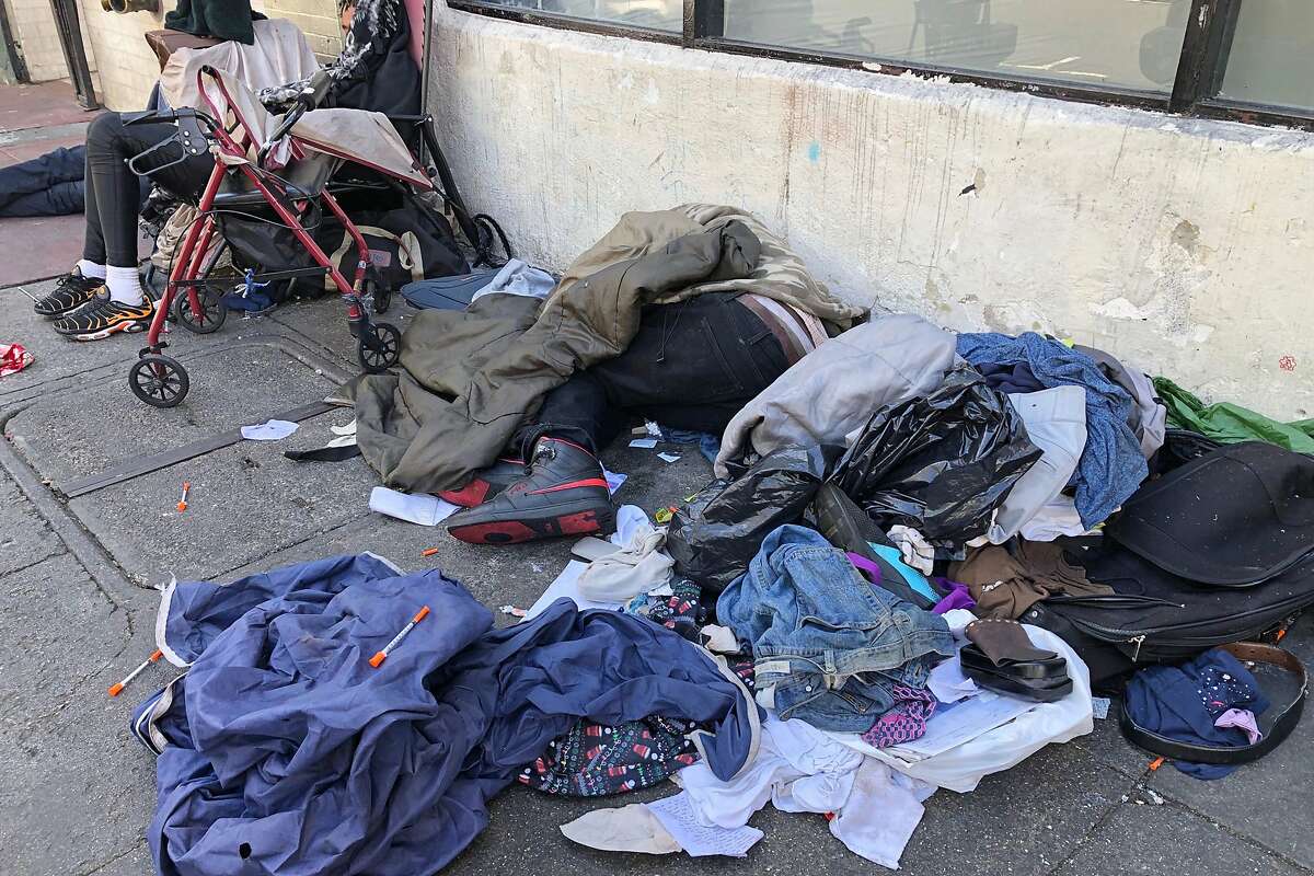 San Francisco has sued 28 alleged drug dealers who frequent the Tenderloin, where broad drug dealing and drug use is common. Here, users are surrounded by needles.