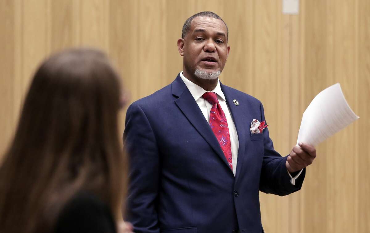 Texas Rep. Jarvis Johnson questions panel members during a public meeting and panel discussion with various city and state agency representatives at the Acres Homes Multi Service Center about a proposed concrete batch plant in the Acres Homes residential area Monday, Jul. 22, 2019 in Houston, TX.