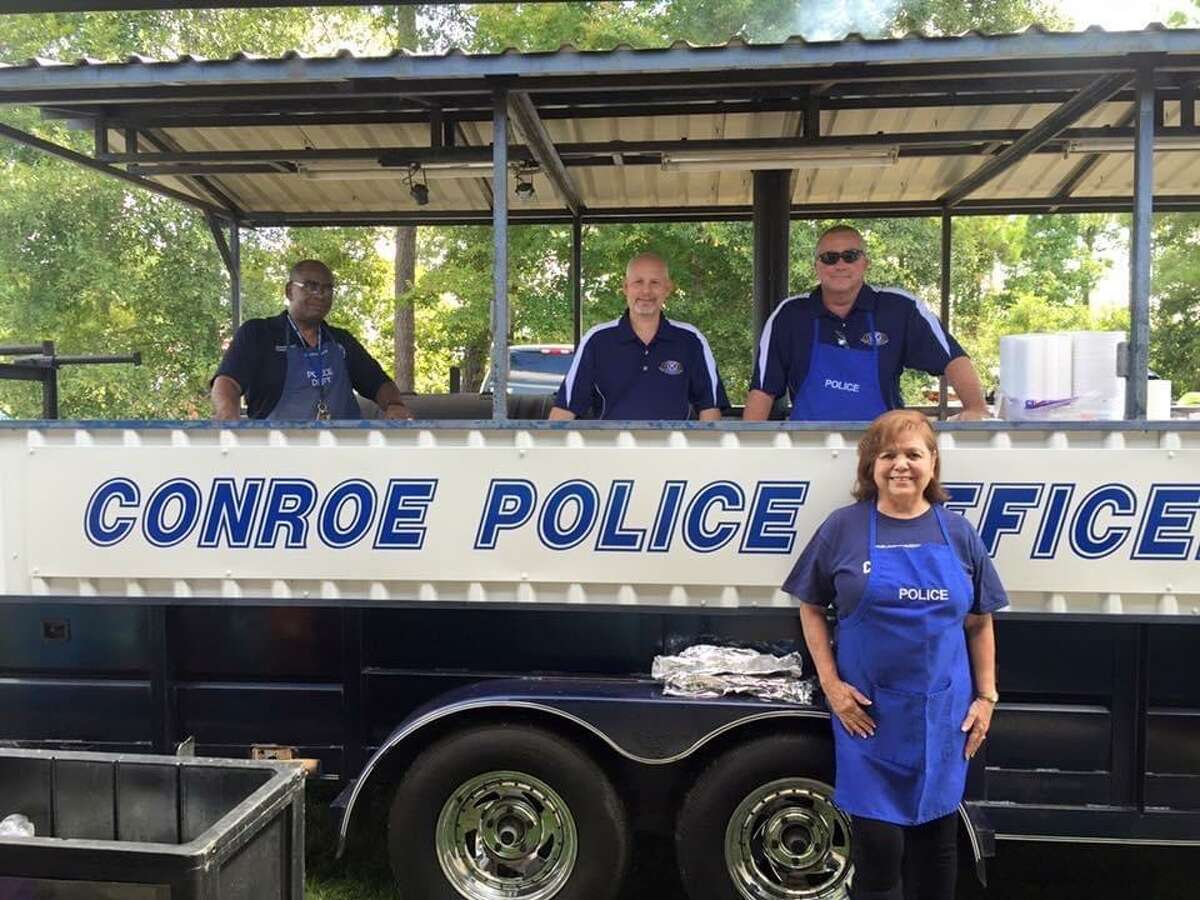 Conroe Police Department year after year brought their barbecue pit out to cook barbecue and hot dogs for the kids and adults that attended Kid Fish and Kid’s Day at the Park.