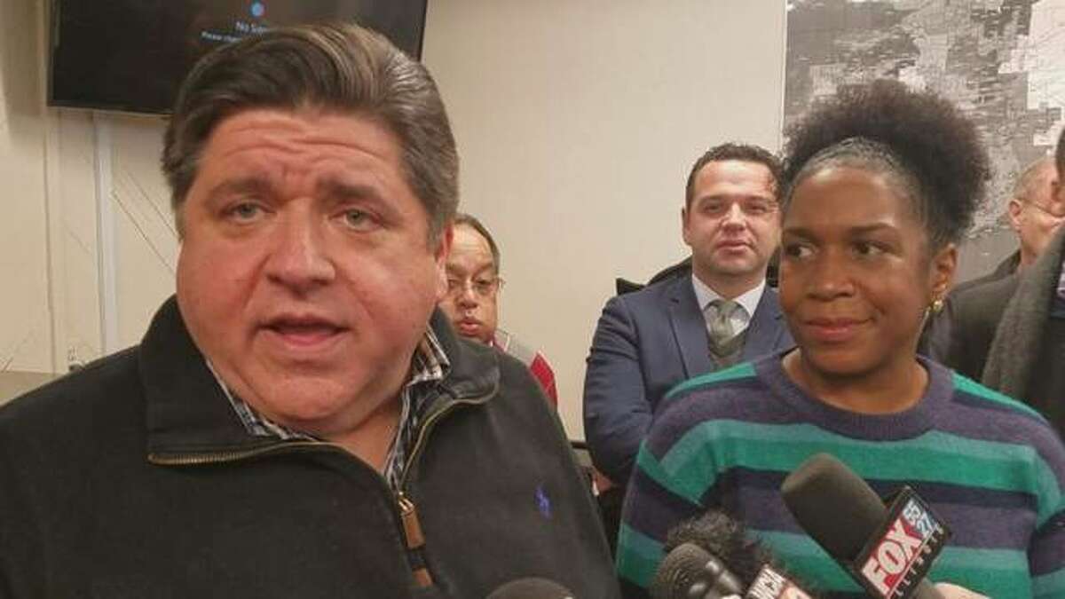 Gov. J.B. Pritzker, left, is seen with Lt. Gov. Juliana Stratton in a 2018 file photo. Stratton this week said if the graduated income tax amendment fails Nov. 3 state residents could see personal income taxes rise by “at least 20%.”