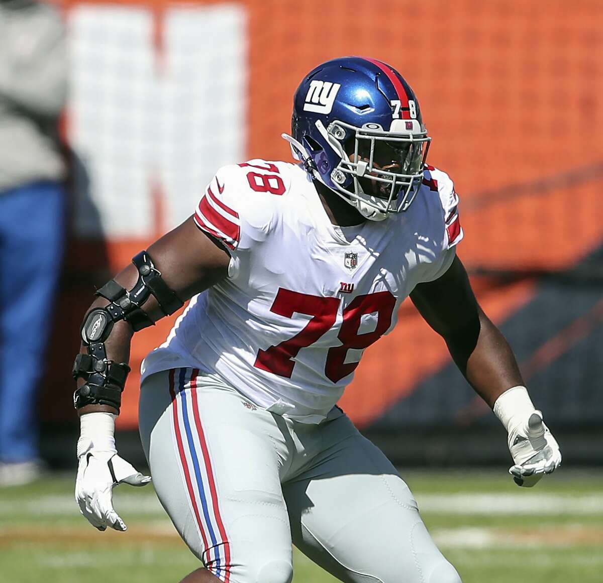 FILE - In this Sunday, Sept. 20, 2020, file photo, New York Giants offensive tackle Andrew Thomas (78) looks to block against the Chicago Bears during the first half of an NFL football game in Chicago. Thomas saw some of the NFL's top passer rushers in his first two games and the rookie left tackle didn't disappoint the Giants. (AP Photo/Kamil Krzaczynski, File)