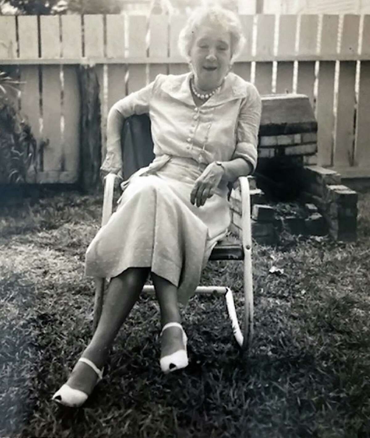 Still active in her 60s, Penelope "Nellie" Borden relaxes in the backyard of her home at 117 Jackson St. in the downtown San Antonio area, near the high school now known as Fox Tech. Borden was a music teacher at that school, previously known as Main Avenue High School, and was also the music editor and columnist for the San Antonio Express. And she wrote for the San Antonio Light.