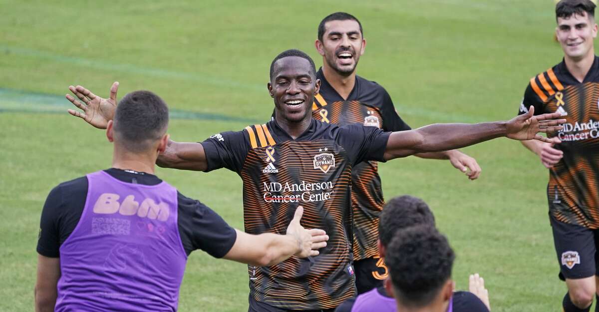 Houston Dynamo defender Maynor Figueroa, center, celebrates after scoring a goal against Nashville SC during the second half of an MLS soccer match Saturday, Sept. 26, 2020, in Nashville, Tenn. The game ended in a 1-1 draw. (AP Photo/Mark Humphrey)