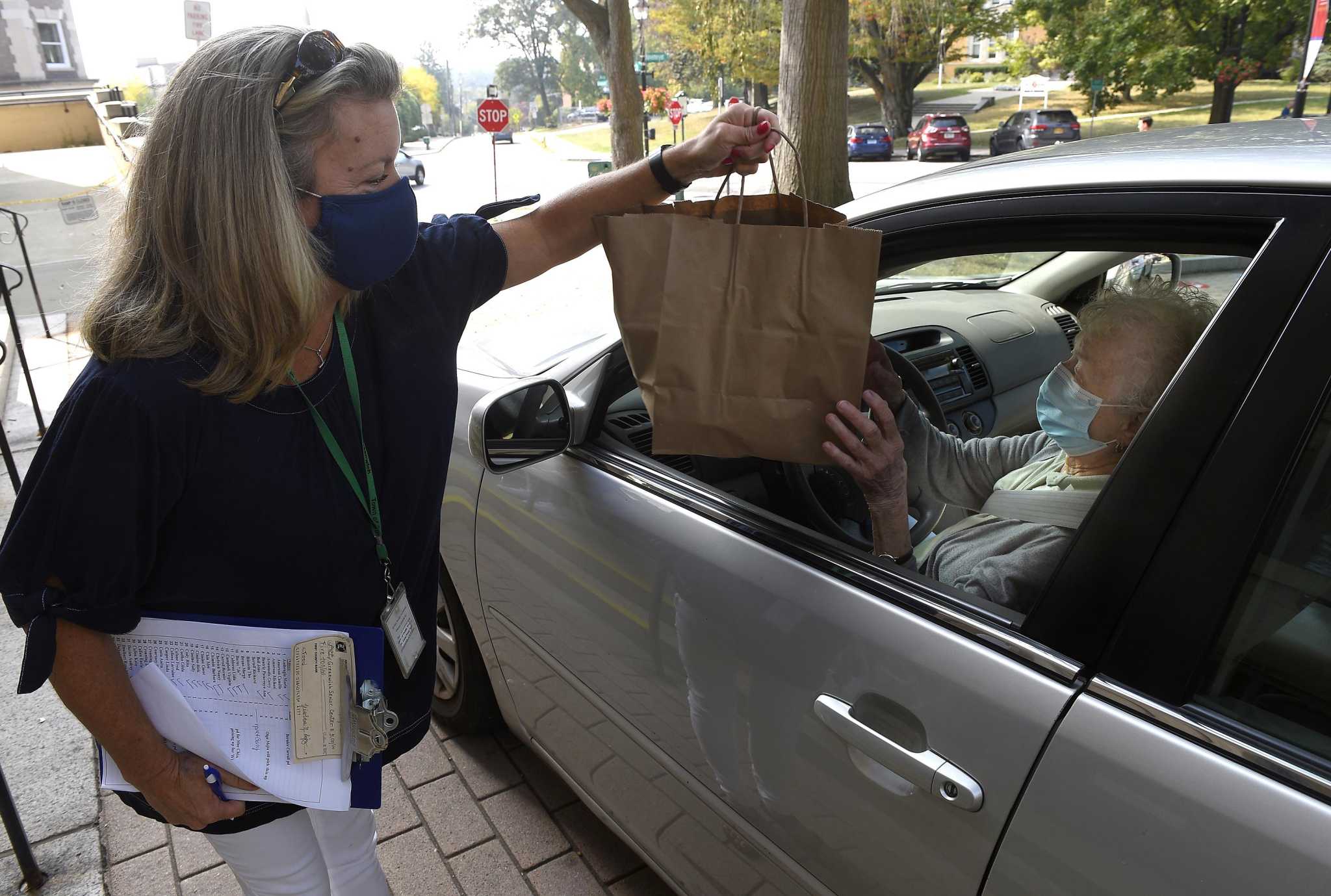 Meal deal: Greenwich seniors enjoy a drive-thru meal