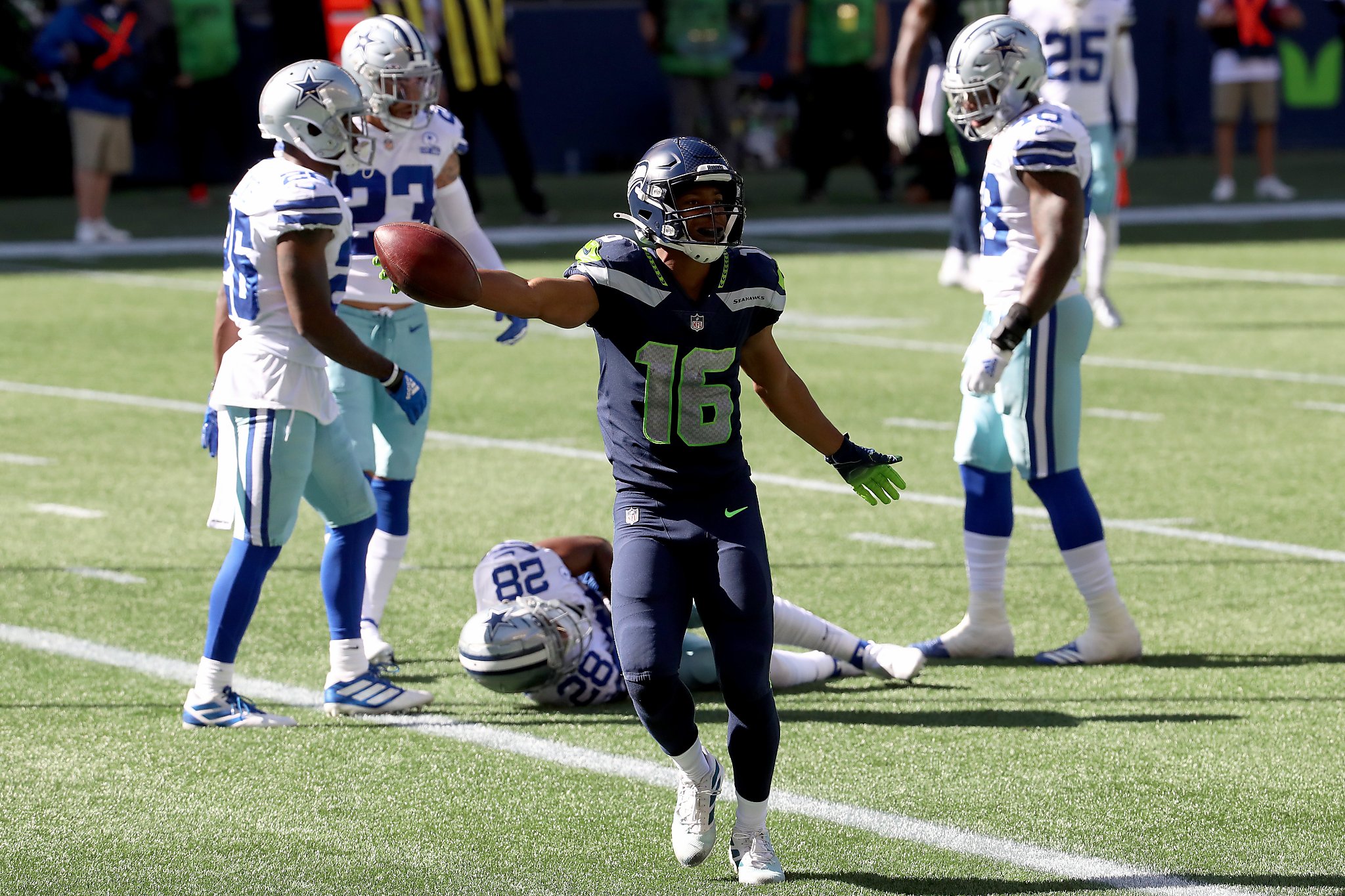 DK Metcalf of the Seattle Seahawks catches the ball over Shaquill News  Photo - Getty Images