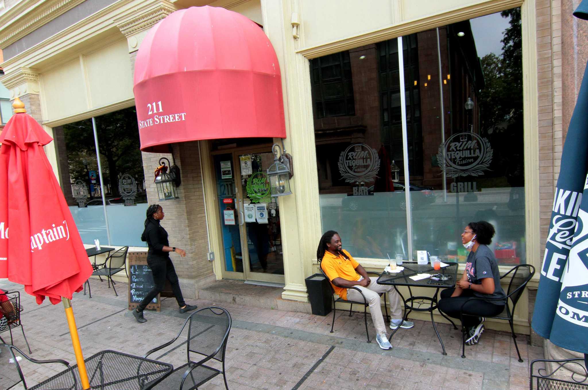 Restaurants want customers. But not too many, which could mean a fine.