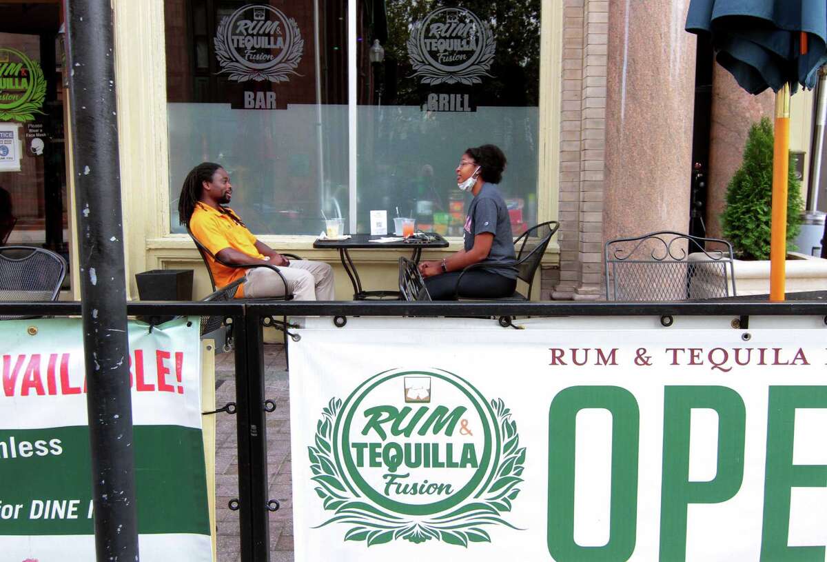 Restaurants want customers. But not too many, which could mean a fine.