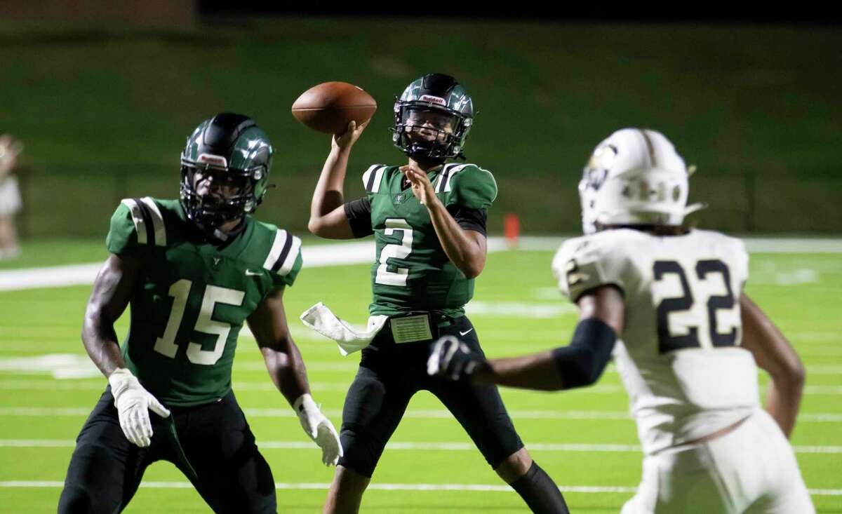 Mayde Creek quarterback Jace Wilson (2) throws the ball during the third quarter of a non-district football game against Conroe at Rhodes Stadium in Katy, Friday, Sept. 25, 2020.