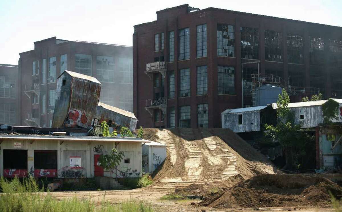 Demolition of Remington Arms building planned as fire lingers