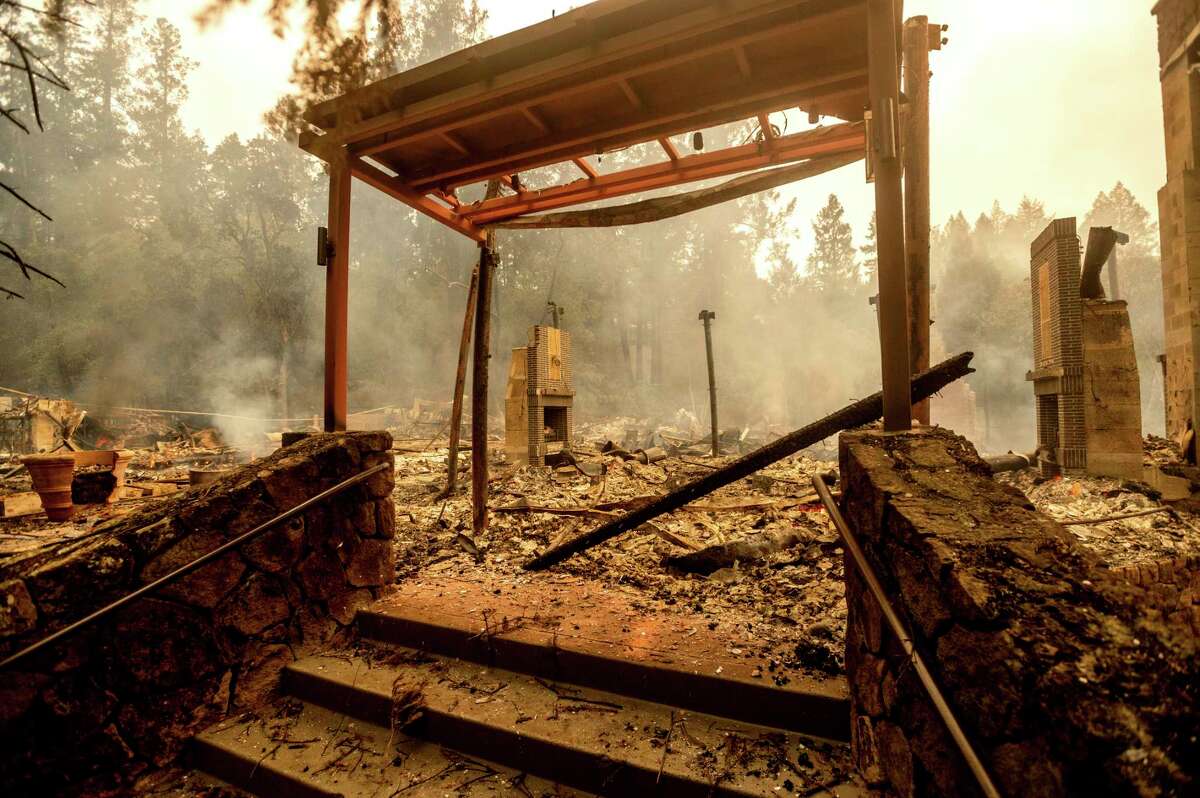 A staircase stands, Monday, Sept. 28, 2020, at the Restaurant at Meadowood, which burned in the Glass Fire, in St. Helena, Calif.