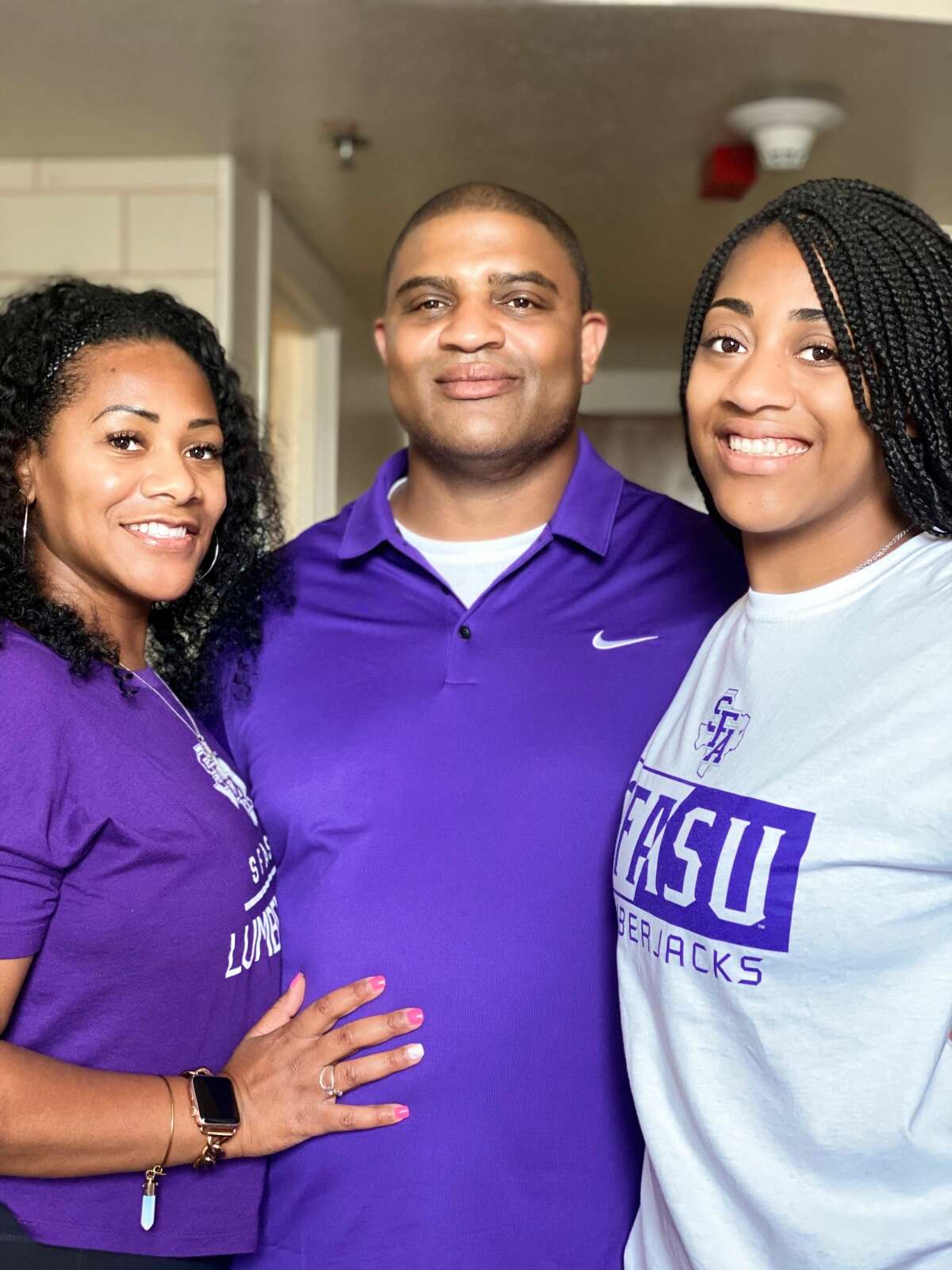 A Black cheerleader at Stephen F. Austin State University says she was awakened by police storming her dorm room on with guns drawn after a group of students made a false report that she had scissors and was threatening to stab people, according to the student's attorney, Randall Kallinen.