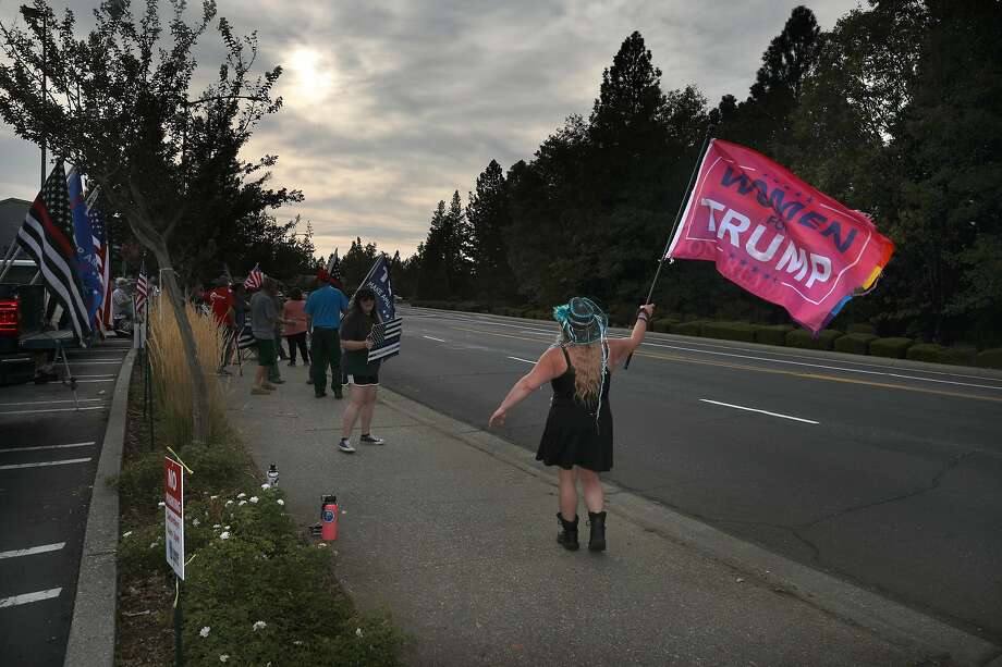 Back the Blue Nevada County including Tiffani Fanucchi (right) rally on the sidewalk in front of K-mart on Saturday, Sept. 26, 2020, in Grass Valley, Calif.  They are a community organization supporting the law enforcement and have 2800 members. Photo: Liz Hafalia / The Chronicle