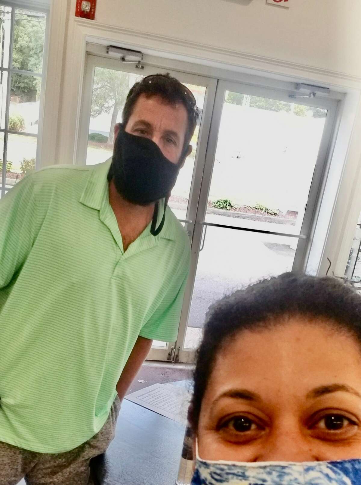 Adam Sandler and Marisol Ballejo at Fred 06825 in Fairfield to pick up food on Sept. 28, 2020. Sandler was passing through with his parents on his way to Philadelphia and arrived at the deli around 2 p.m. to pick up food with which he planned to break his Yom Kippur fast, according to owner Fred Kaskowitz. He entered alone wearing a black mask and ordered turkey meatballs, sweet and sour peppers and panko-crusted chicken; Kaskowitz said they threw in a free brownie for "good luck."  