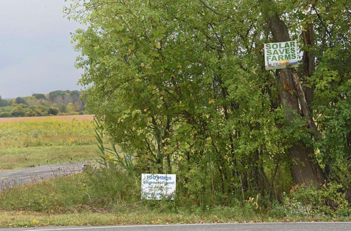 A "solar saves farms" sign is seen on a tree near land where a large solar farm is planning on being built on Tuesday, Sept. 29, 2020 in Coxsackie, N.Y. (Lori Van Buren/Times Union)