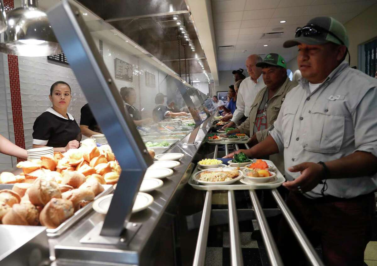 Cleburne Cafeteria with a line of people, during their soft opening on Tuesday, Nov. 14, 2017, in Houston after reopening 19 months after the building burned down in a fire. ( Karen Warren / Houston Chronicle )