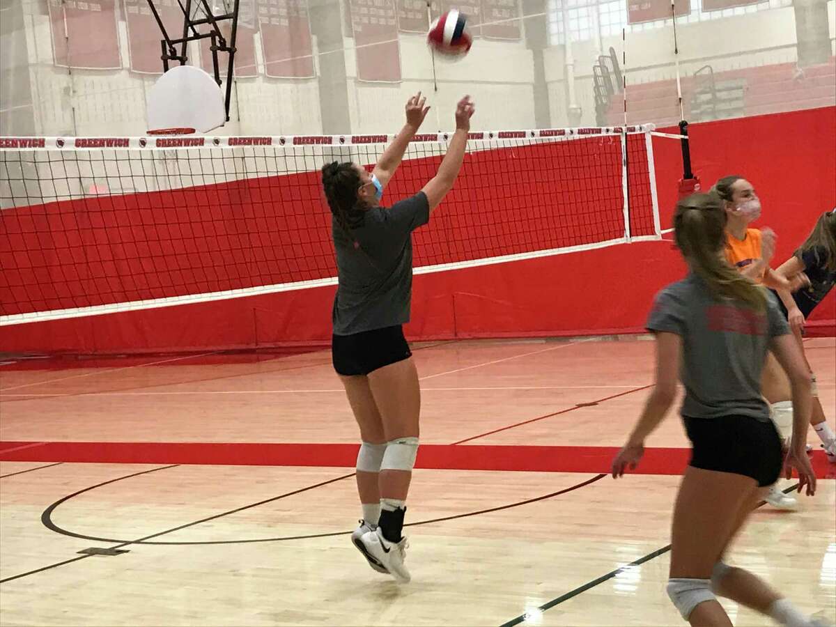 Lilly Saleeby sets the ball during volleyball practice at Greenwich High School on Tuesday, Sept. 29, 2020. Saleeby is a senior captain of the Cardinals’ girls volleyball team.
