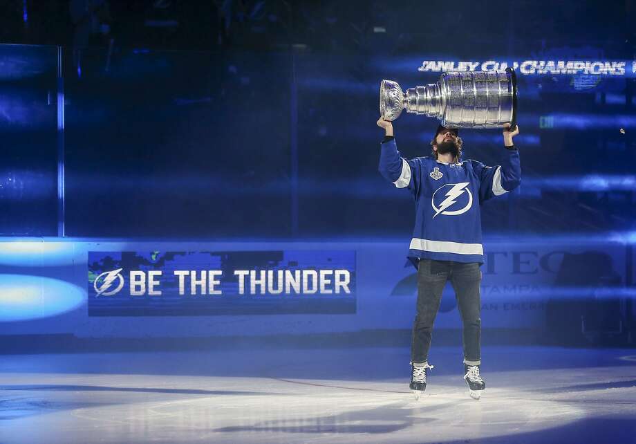 Tampa Bay Lighting's Nikita Kucherov kisses the Stanley Cup while skating around Amalie Arena, Tuesday, Sept. 29, 2020, in Tampa, Fla. (Dirk Shadd/Tampa Bay Times via AP) Photo: Dirk Shadd / Associated Press