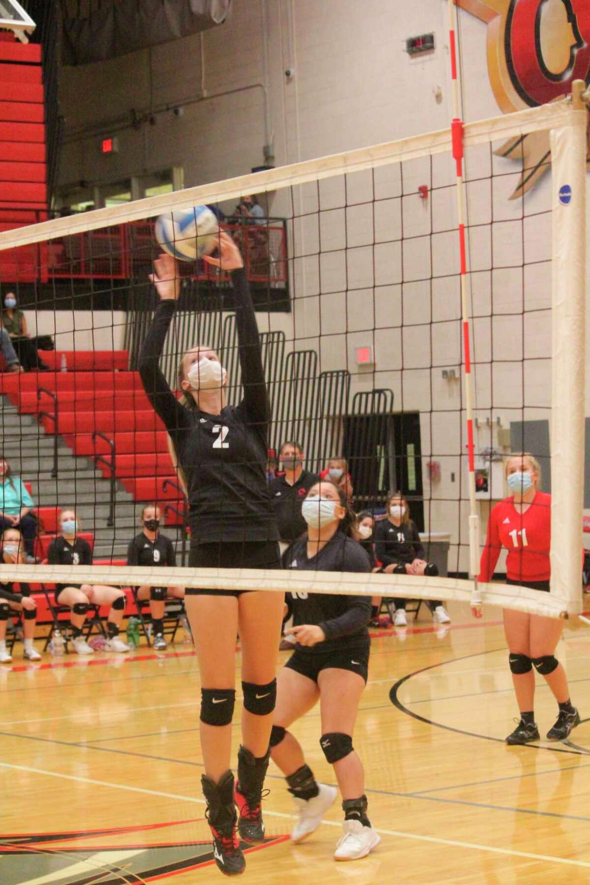 Reed City's Kyleigh Weck (2) works with the ball against Chippewa Hills. (Herald Review photo/John Raffel)