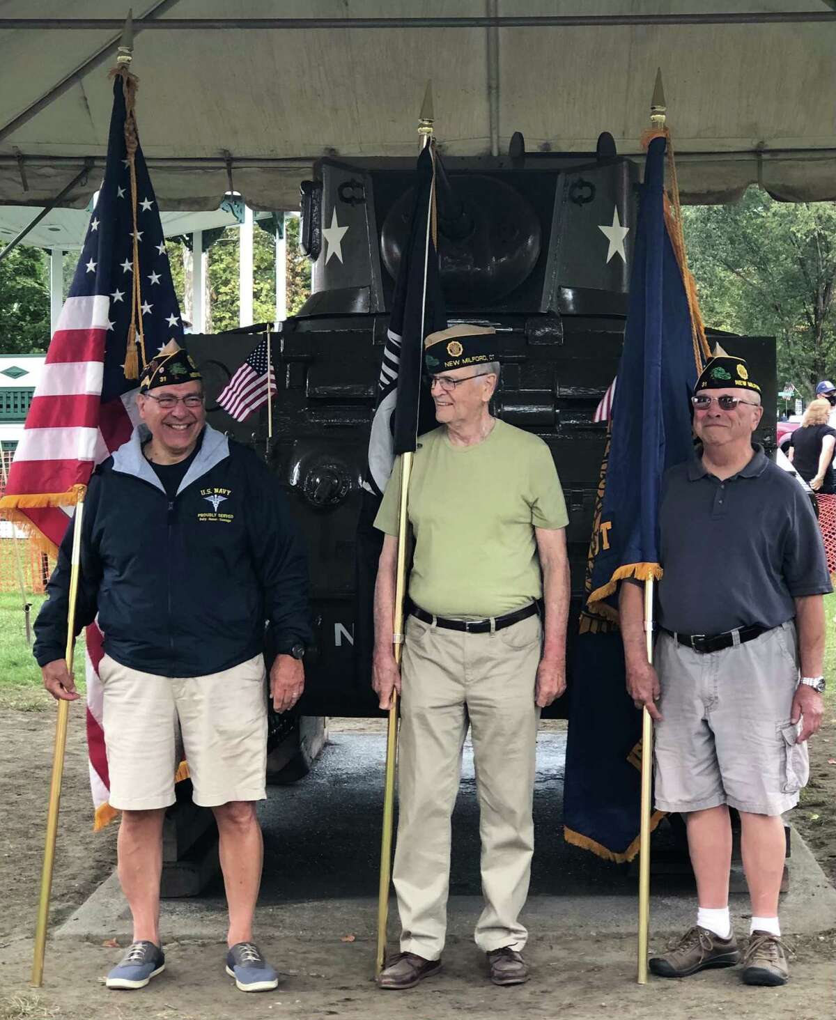 American Legion Post 31 Honor Guard members, from left to right, Bob Greco, Dan Sullivan and Rocco Barberio, stand proud and pleased as they wait for the start of Saturday’s rededication ceremony of the restored tank.