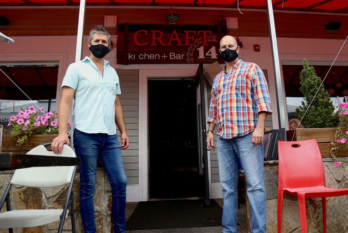 Mario Lopez, owner, left, and Dave Curtis, manager, of Craft 14 Kitchen + Bar in Wilton Center will participate in Wilton's 9th Annual Restaurant Week, Oct. 19-25.