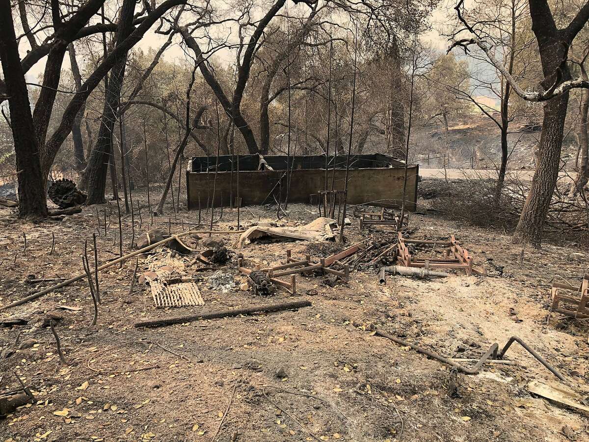 The ghostly remnants of what appear to have been a machine shed at the Deer Park location on North Fork Crystal Springs Road that Cal Fire believes is the origin point for the Glass Fire.