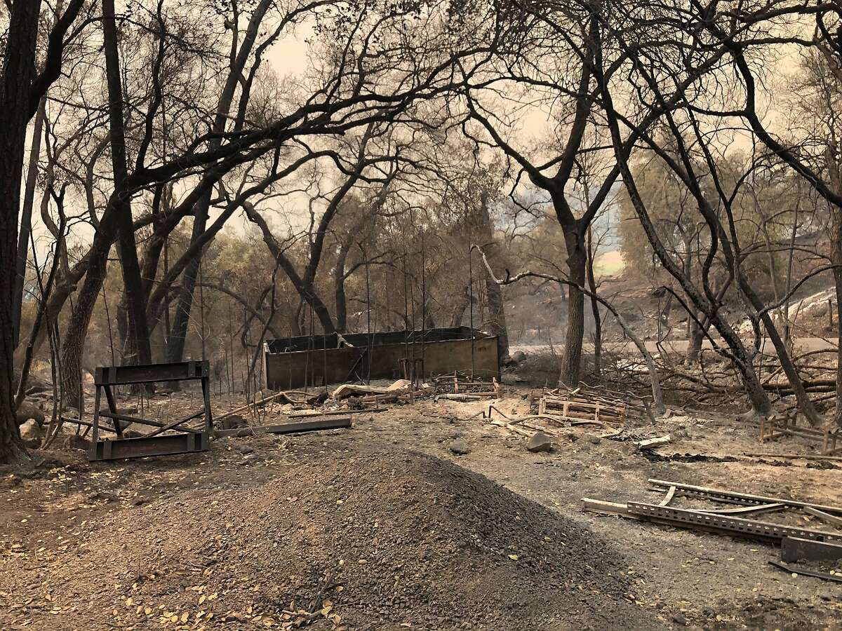 The ghostly remnants of what appear to have been a machine shed at the Deer Park location on North Fork Crystal Springs Road that Cal Fire believes is the origin point for the Glass Fire.