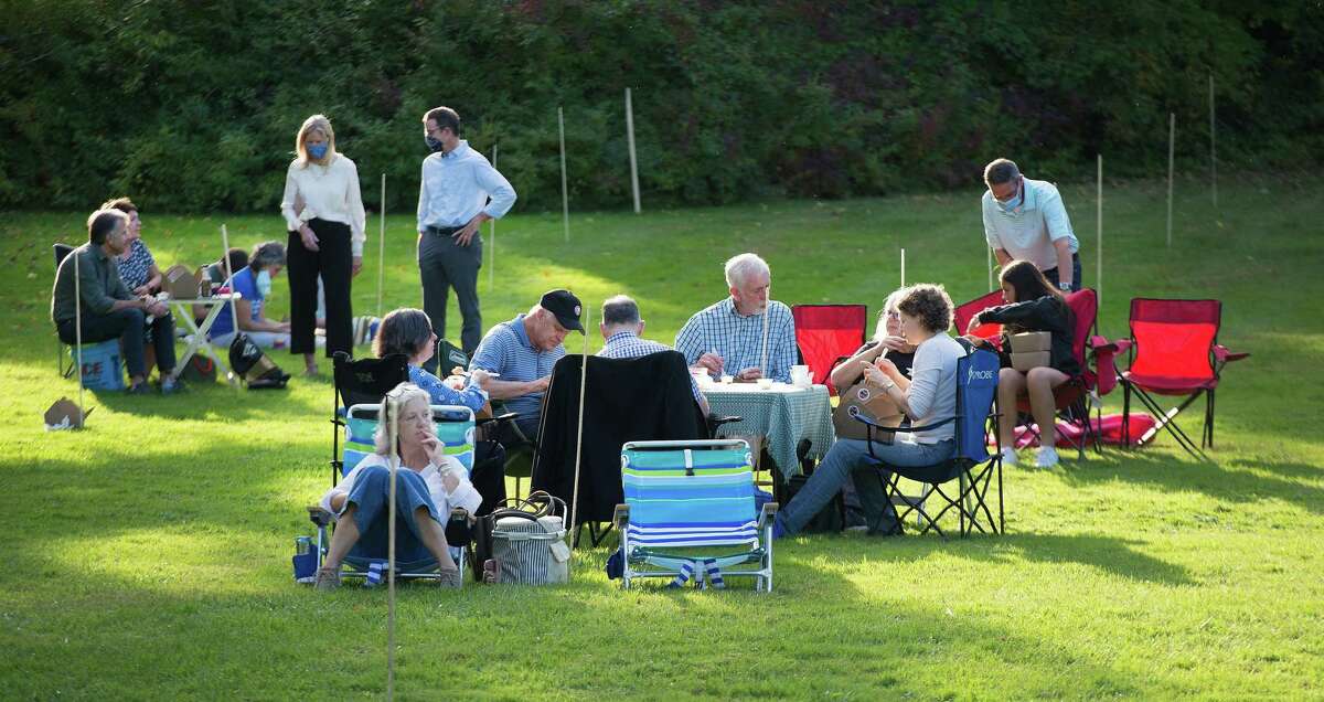 A small crowd enjoys the music of the Catoonah Street Jazz & Blues Society at St. Stephen's Nutmeg & Neighbors BBQ on Saturday, September 26, 2020 in Ridgefield, Connecticut. The event was also streamed live on Facebook. A small crowd enjoys the music of the Catoonah Street Jazz & Blues Society at St. Stephen’s Nutmeg & Neighbors BBQ on Saturday, September 26, 2020 in Ridgefield, Connecticut. The event was also streamed live on Facebook.
