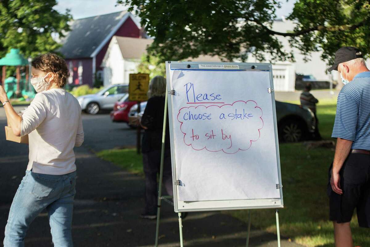A small crowd enjoys the music of the Catoonah Street Jazz & Blues Society at St. Stephen's Nutmeg & Neighbors BBQ on Saturday, September 26, 2020 in Ridgefield, Connecticut. The event was also streamed live on Facebook. A small crowd enjoys the music of the Catoonah Street Jazz & Blues Society at St. Stephen’s Nutmeg & Neighbors BBQ on Saturday, September 26, 2020 in Ridgefield, Connecticut. The event was also streamed live on Facebook.