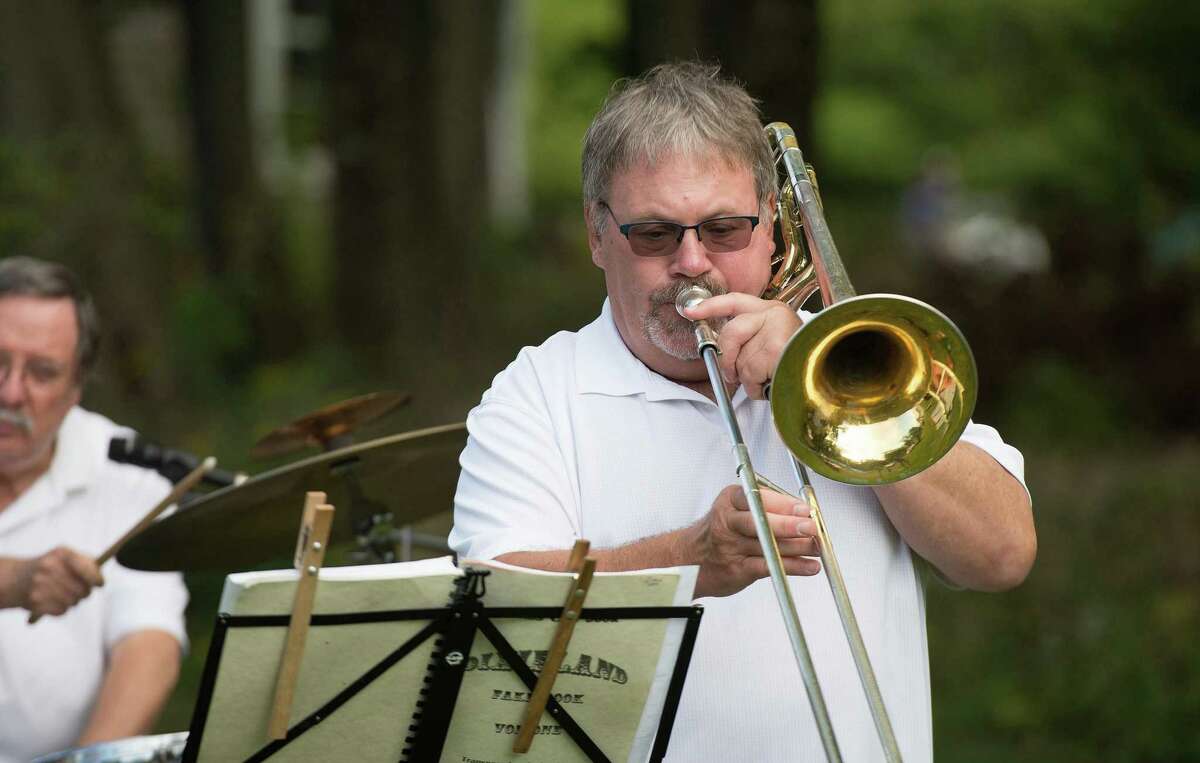 Bob Carlson plays the trombone with the Catoonah Street Jazz & Blues Society at St. Stephen's Nutmeg & Neighbors BBQ on Saturday, September 26, 2020 in Ridgefield, Connecticut. The event was also streamed live on Facebook. Bob Carlson plays the trombone with the Catoonah Street Jazz & Blues Society at St. Stephen’s Nutmeg & Neighbors BBQ on Saturday, September 26, 2020 in Ridgefield, Connecticut. The event was also streamed live on Facebook.
