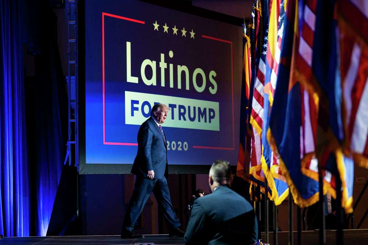 President Donald Trump arrives for a Latinos for Trump Coalition roundtable campaign event at Arizona Grand Resort & Spa in Phoenix, Monday, Sept. 14, 2020.