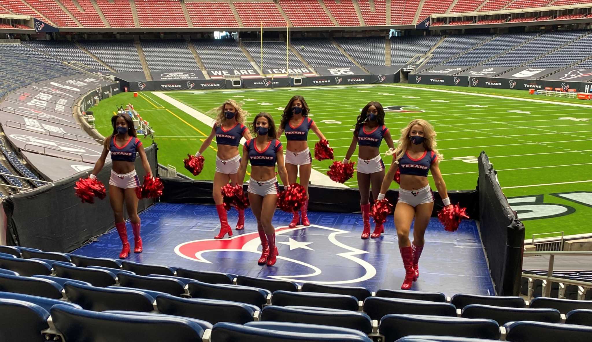 HOUSTON, TX - OCTOBER 02: Houston Texans Cheerleaders rev up the crowd  during the football game between the Los Angeles Chargers and Houston Texans  at NRG Stadium on October 2, 2022 in