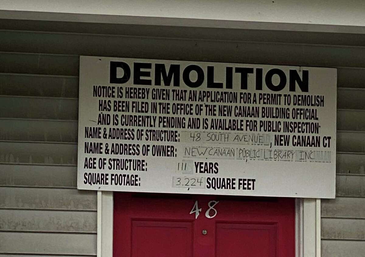 A notice of demolition was hanging over the door of the 111-year-old home at 48 South Ave. in New Canaan, on Tuesday, Sept. 29. The 3,224 square- foot building is owned by the New Canaan Library.