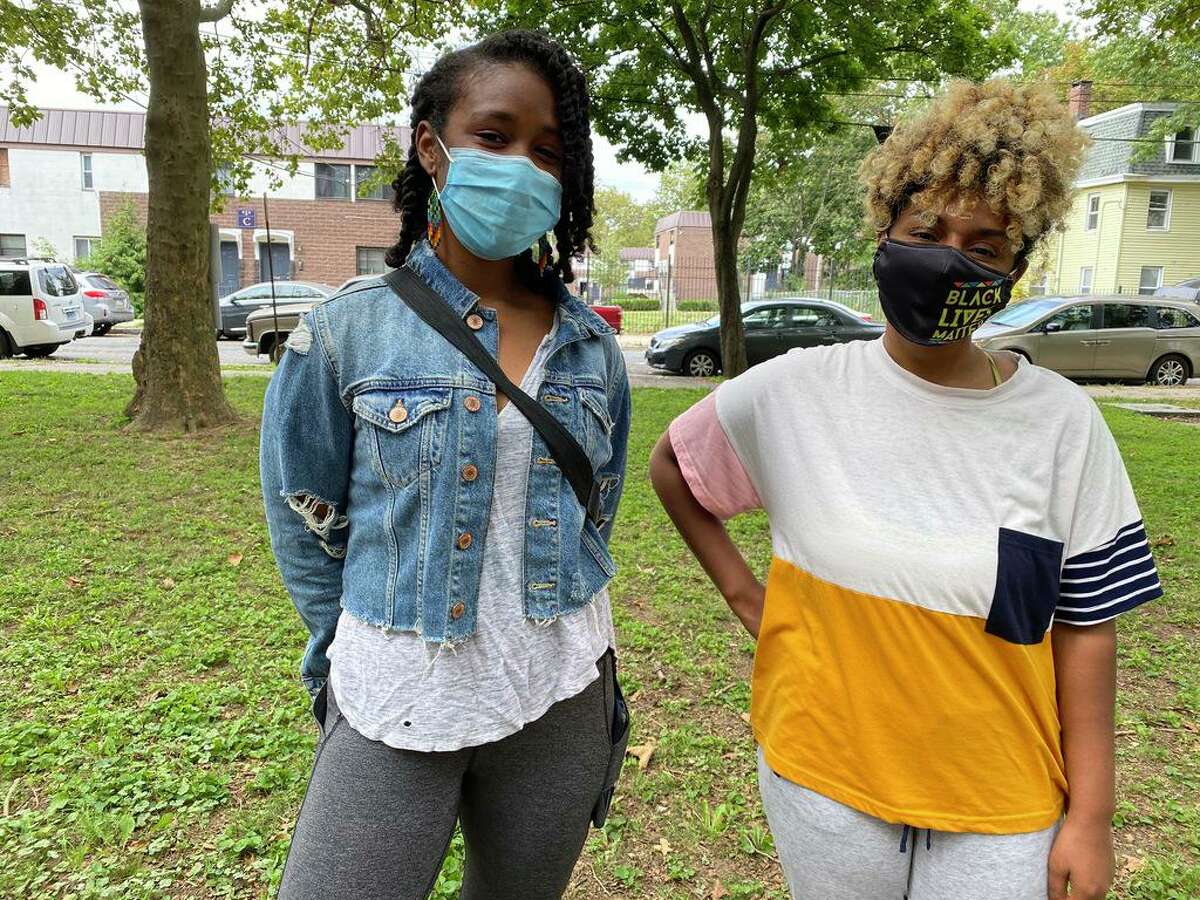 Nia Campina Bacote, left, Lucretia Gill in Kensington Park, both are nearby residents to the park who view it as an asset.