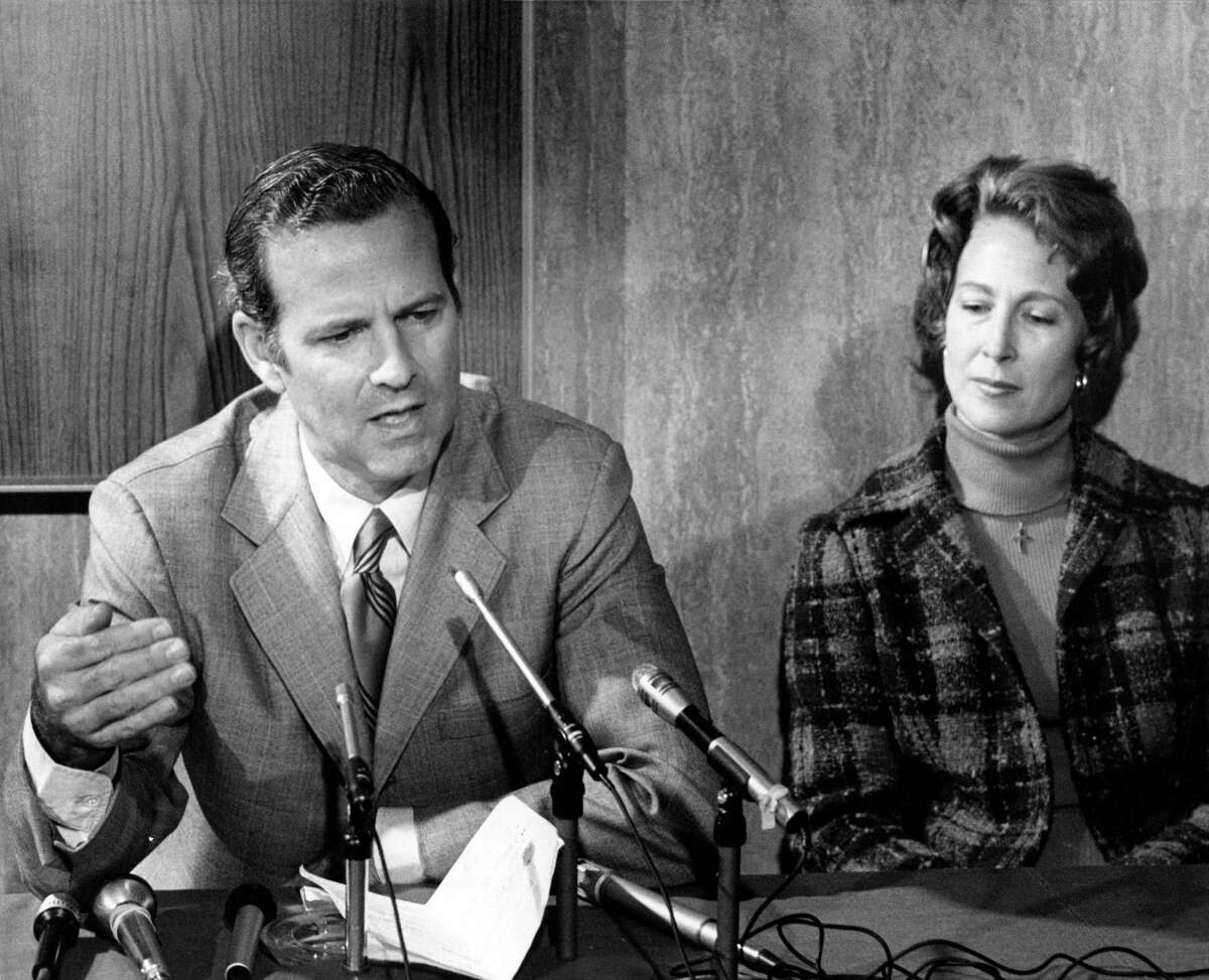 01/31/1978 - James Baker III, candiidate for Texas Attorney General, speaks to news media. His wife, Susan, listens at right.