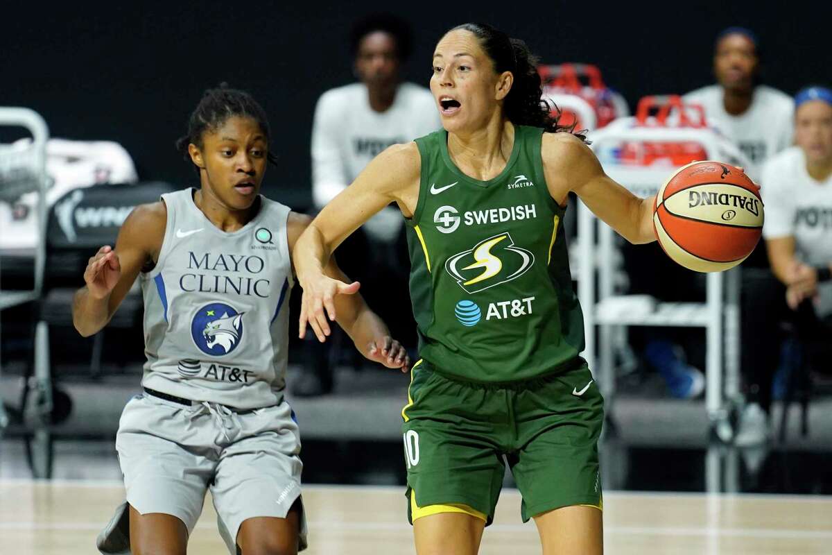 Seattle Storm guard Sue Bird (10) drives around Minnesota Lynx guard Crystal Dangerfield (2) during the second half of Game 2 of a WNBA playoff semifinal last Thursday.