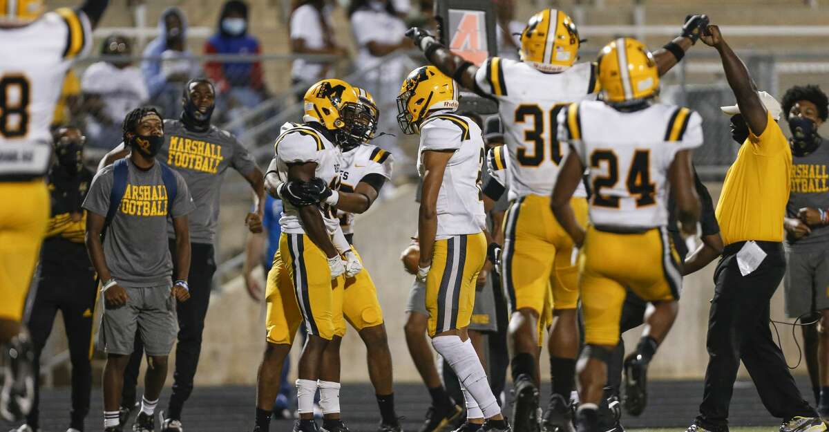 Fort Bend Marshall defensive back Chris Stephens (10) celebrates after deflecting a pass in the end zone as time ran out at Kenneth Hall Stadium Thursday, Oct. 1, 2020, in Missouri City , Texas. The play gave Fort Bend the 7-0 win.