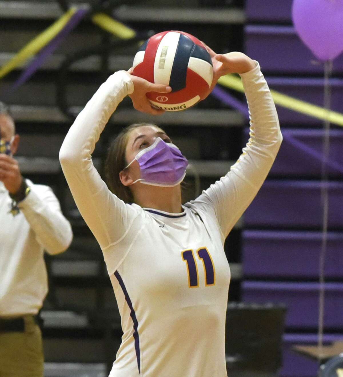 Westhill's Vana Servos (11) sets the ball during the Vikings' season-opening volleyball match against Stamford at Westhill High School on Thursday, Oct. 1, 2020