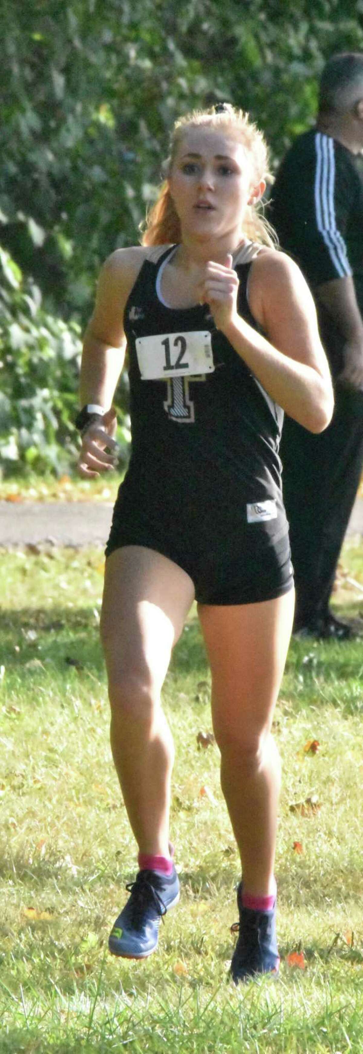 Junior Kali Holden led from start to finish in Trumbull's season opening dual meet victory against St. Joseph.
