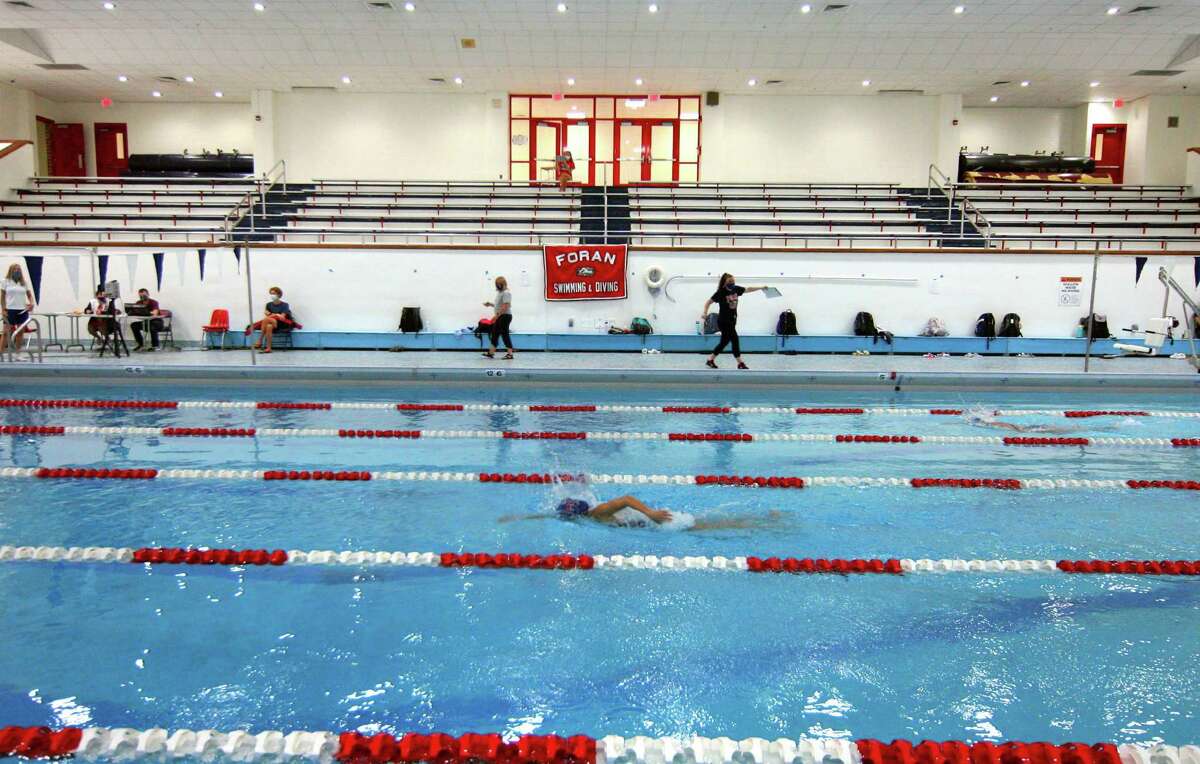 Opponents 19 miles away Girls swimming returns at Foran with unusual