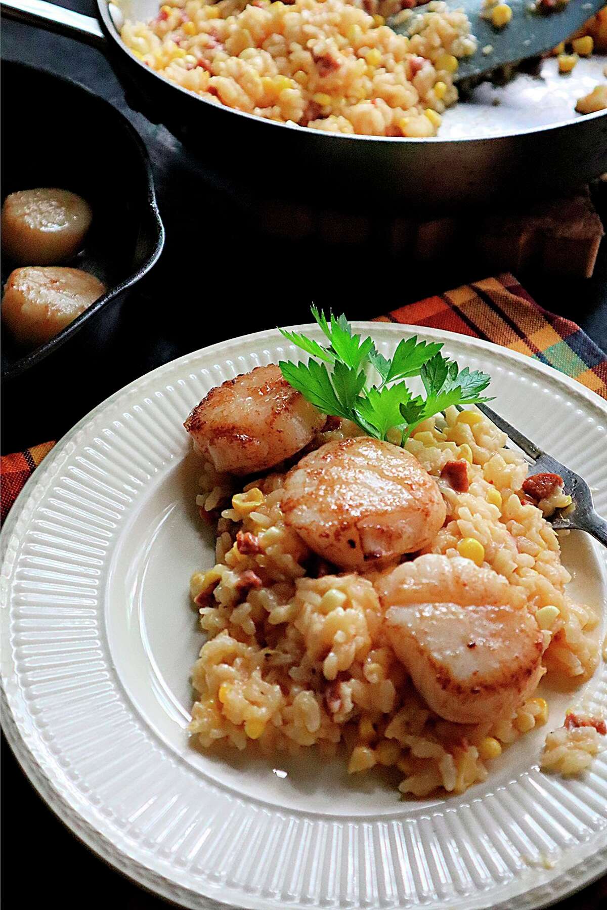 Seared scallops on corn and chorizo risotto