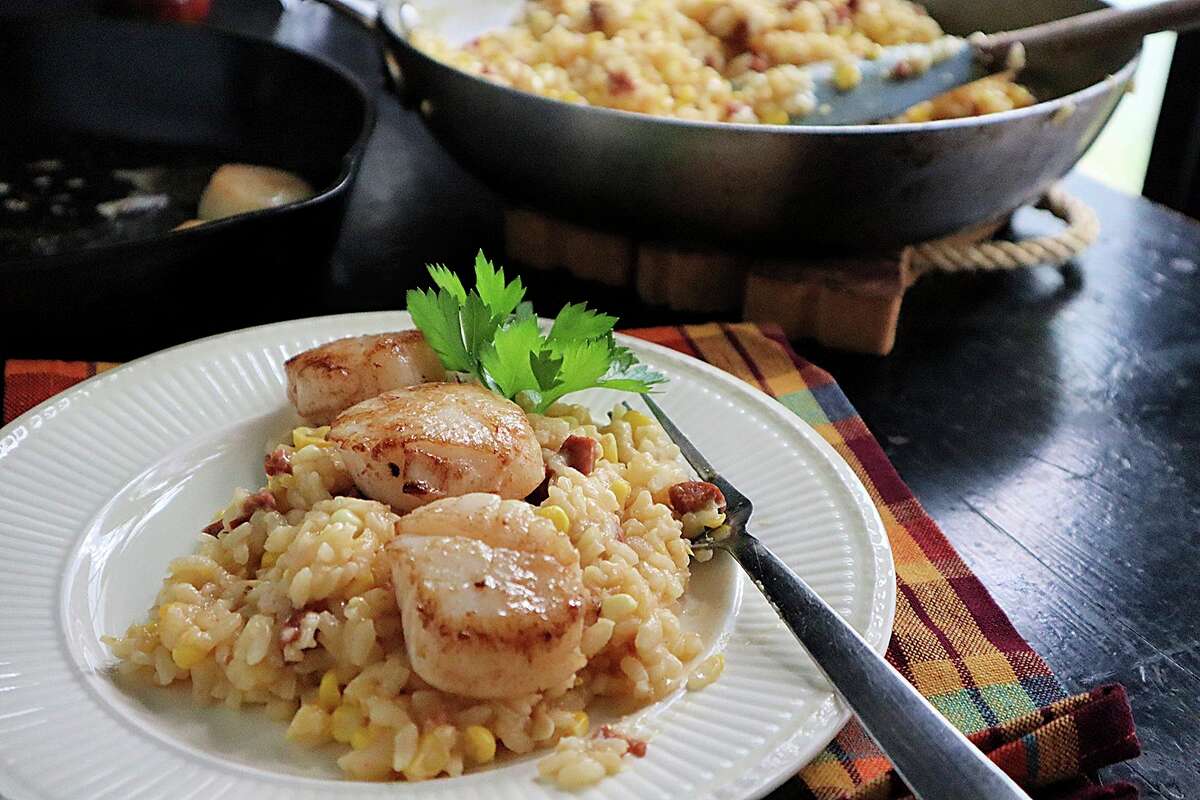 Seared scallops on corn and chorizo risotto