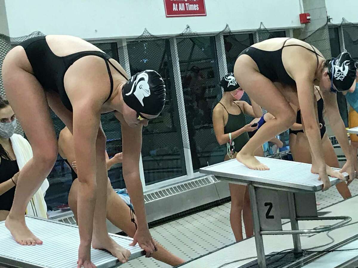 Stamford/Westhill swimmers get set to race during their meet against Greenwich on Friday, October 2, 2020, in Greenwich, Connecticut.