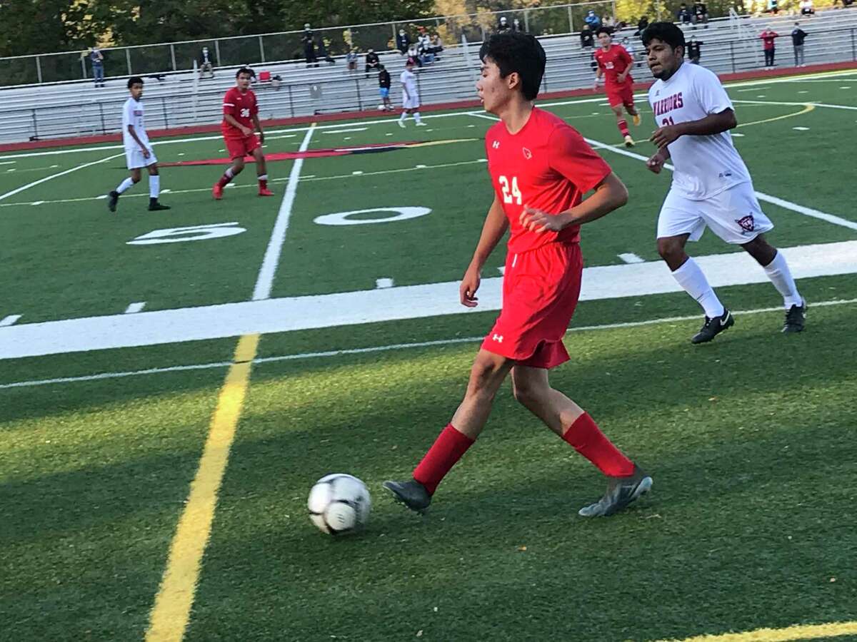 Isaiah Sohn of Greenwich looks to pass during the Cardinals’ soccer game on Friday, October 3, 2020, in Greenwich. The Cardinals defeated Wright Tech, 7-0.