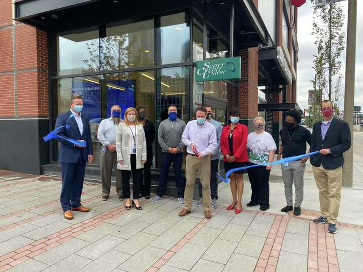 Scott Credit Union officially celebrated the opening of its new branch in Ballpark Village with a ceremonial ribbon cutting on Monday with the St. Louis Regional Chamber of Commerce and representatives from the St. Louis Cardinals and Ballpark Village